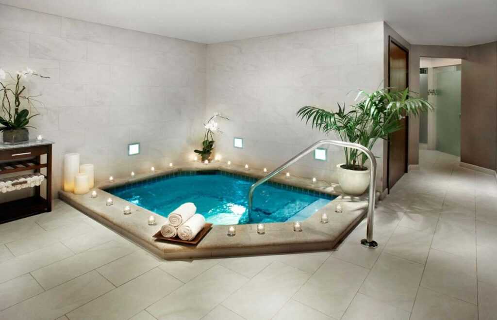 spa hot tub with candles surrounding the exterior