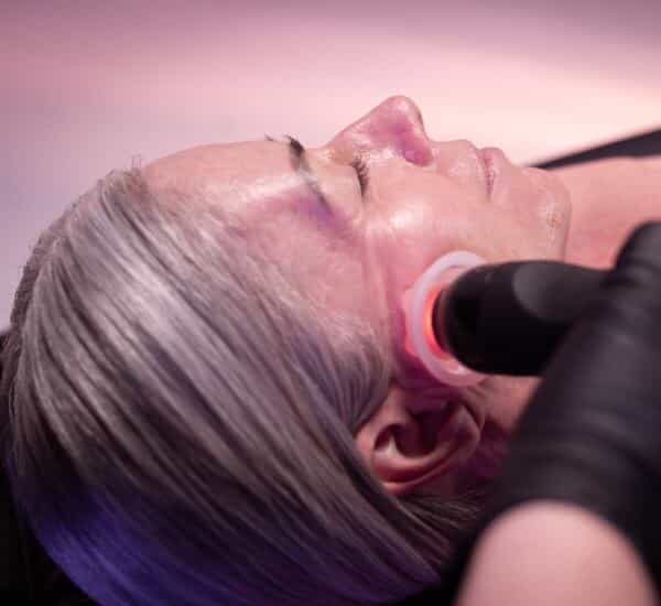 Women getting face treatment