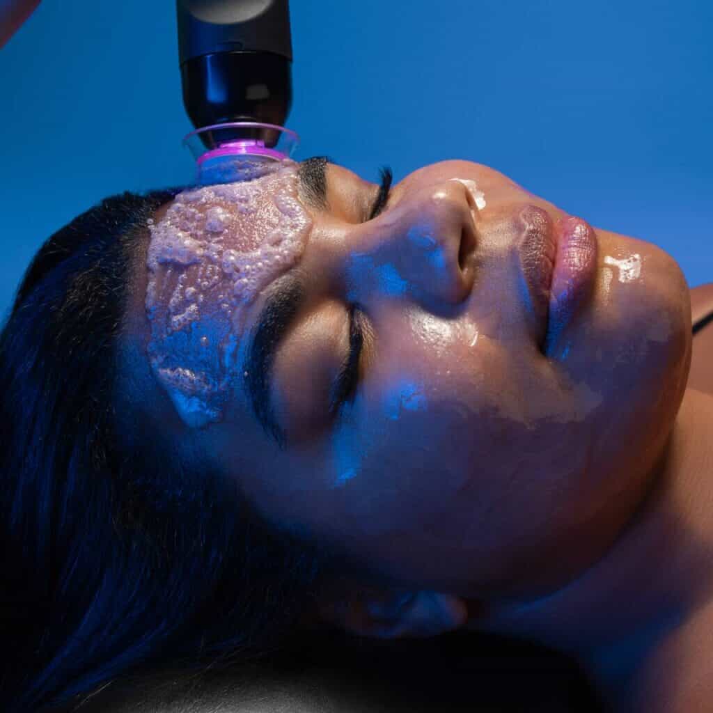 Women getting face treatment