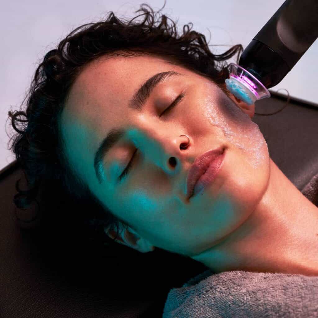 Women getting face treatment